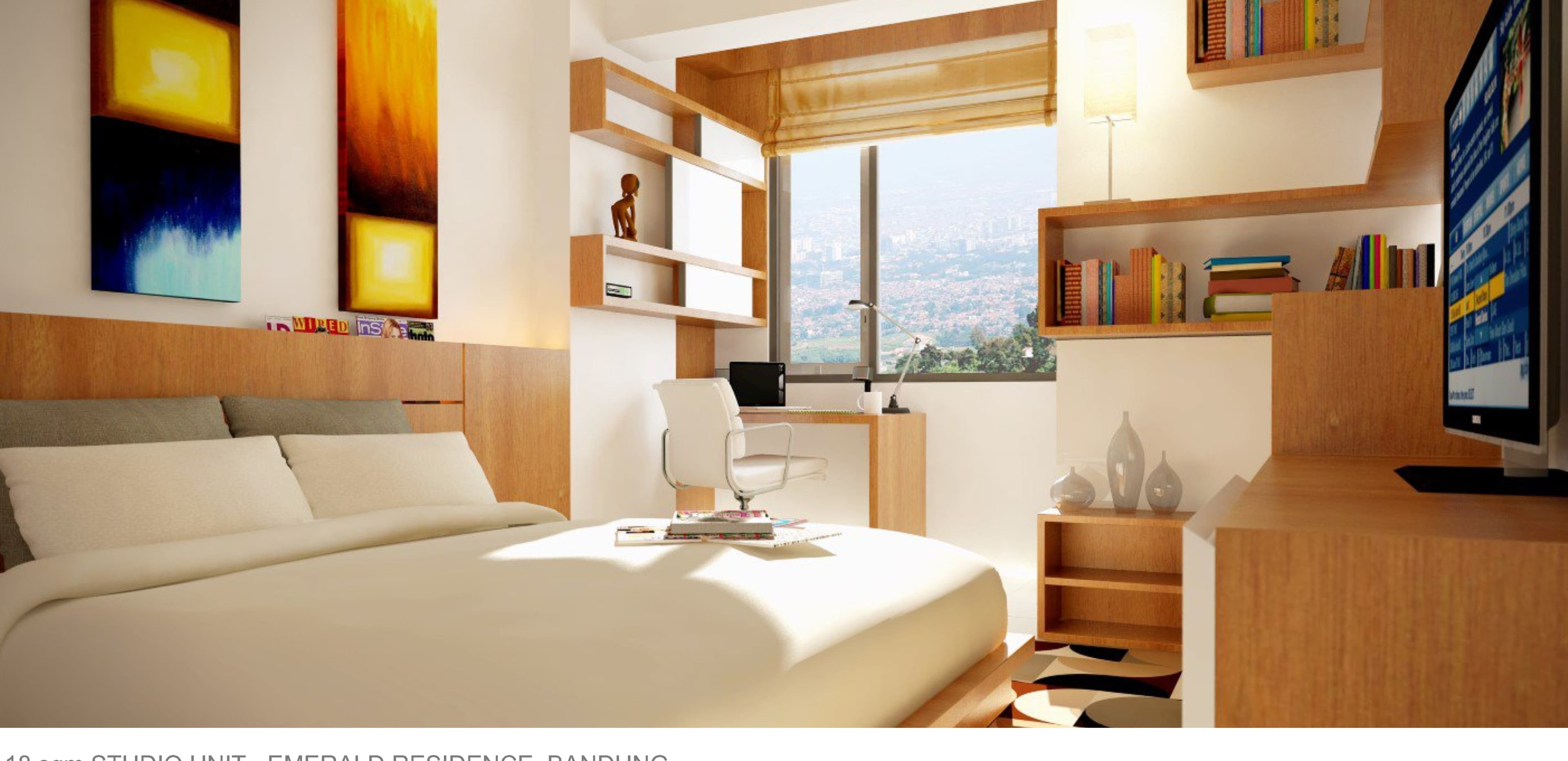 Studio Unit, Emerald Residence (18 sqm) — bedroom view with decorative wall art and open shelving.