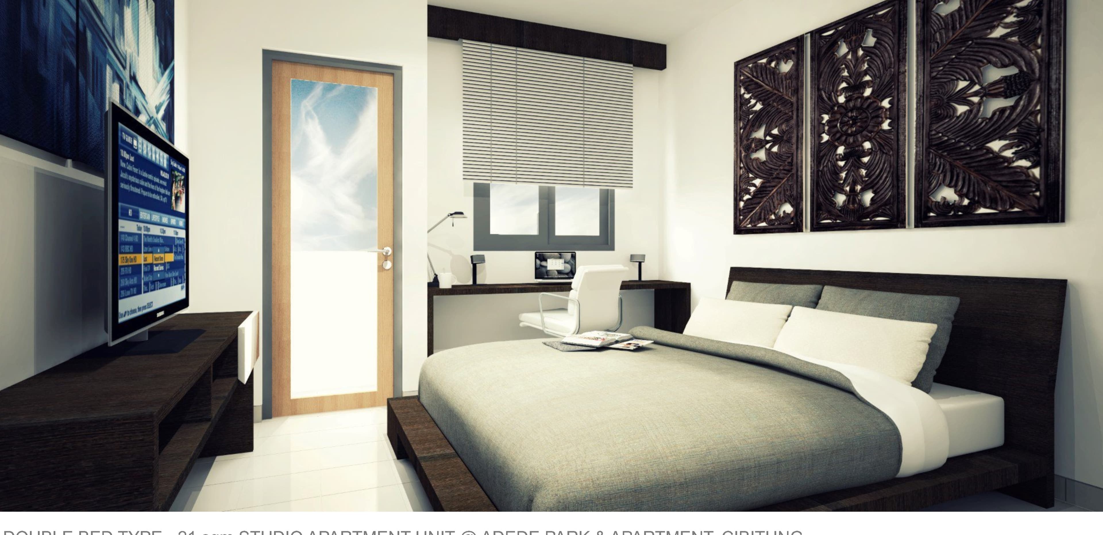 Double Bed Studio Unit, Adede Park & Apartment — room view with carved wood panel.